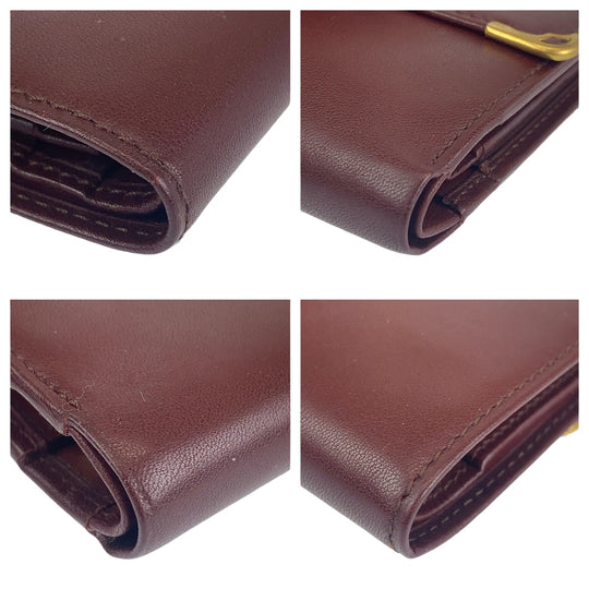 CARTIER Tri-fold wallet leather wine-red Must Line