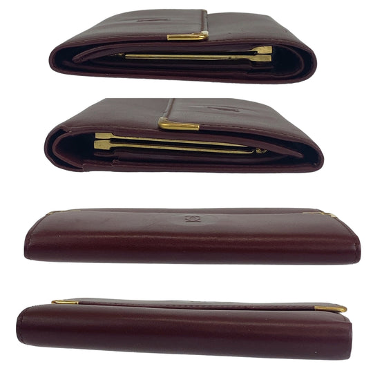 CARTIER Tri-fold wallet leather wine-red Must Line