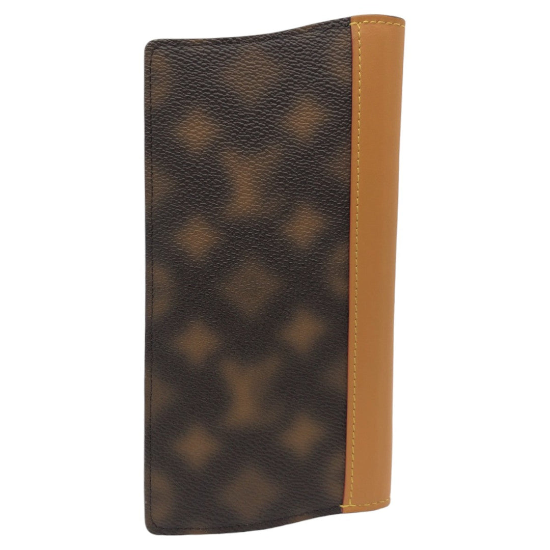 LOUIS VUITTON Long Wallet Purse M81596 PVC Brown Gold Metal Long Wallet Purse This is knot monogram Portefeuille Braza mens Used Authentic