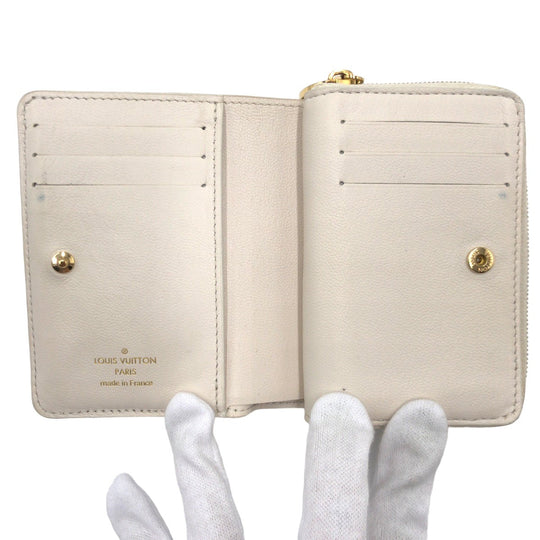 LOUIS VUITTON Bifold Wallet M82291 leather Beige Gold Metal Bifold Wallet compact wallet Monogram Portefeuille You Women Used Authentic