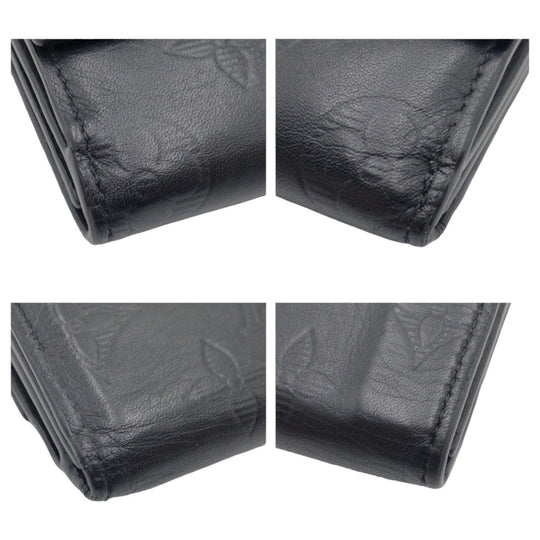 LOUIS VUITTON Tri-fold wallet M67631 PVC Black SilverMetal Folding wallet Compact wallet Monogram shadow Discovery compact wallet mens Used Authentic