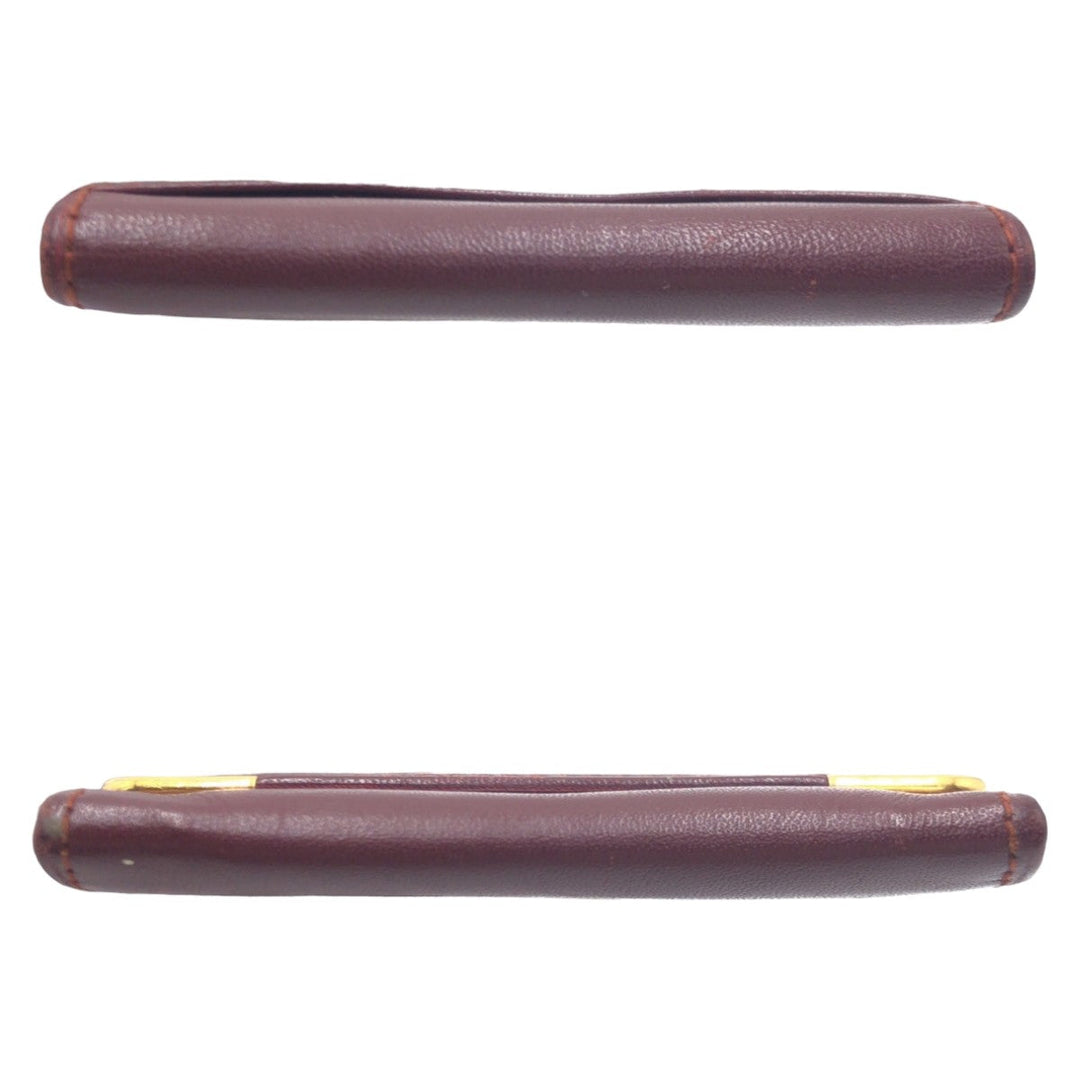 CARTIER Coin case leather wine-red Must Line