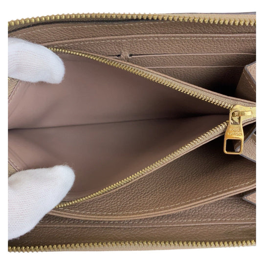 LOUIS VUITTON Long Wallet Purse M69034 leather Tourterelle Greige Gold Metal Long Wallet Purse Zip Around Unisex Monogram Unplant Zippy wallet Women Used Authentic