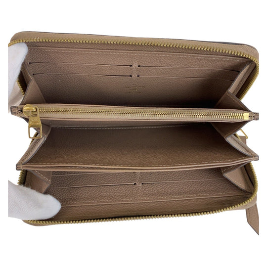 LOUIS VUITTON Long Wallet Purse M69034 leather Tourterelle Greige Gold Metal Long Wallet Purse Zip Around Unisex Monogram Unplant Zippy wallet Women Used Authentic