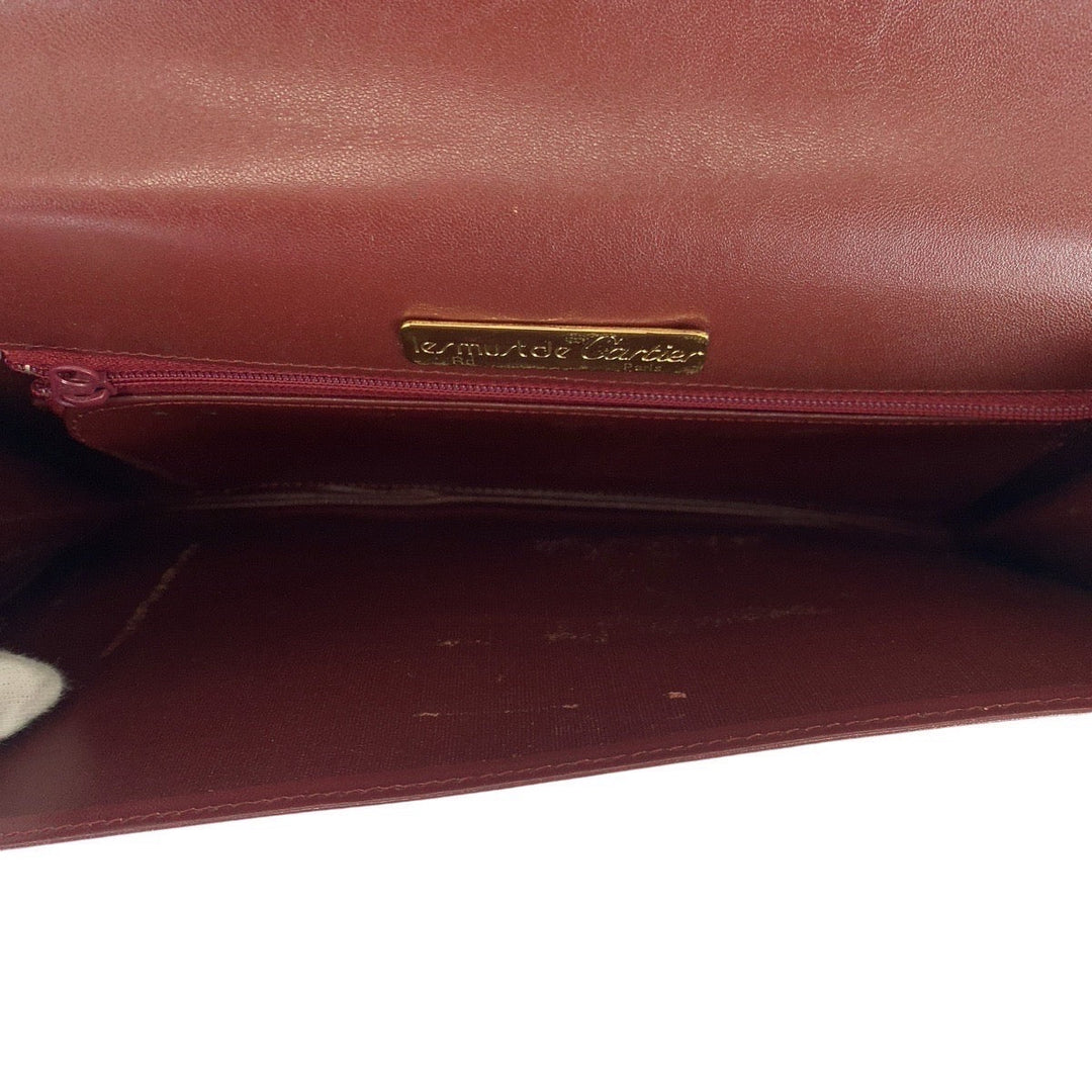 CARTIER Clutch bag leather wine-red Must Line