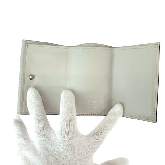 LOUIS VUITTON Tri-fold wallet M30899 PVC, Taiga Bron White SilverMetal Folding wallet Compact wallet Monogram Tiger Llama Discovery mens Used Authentic