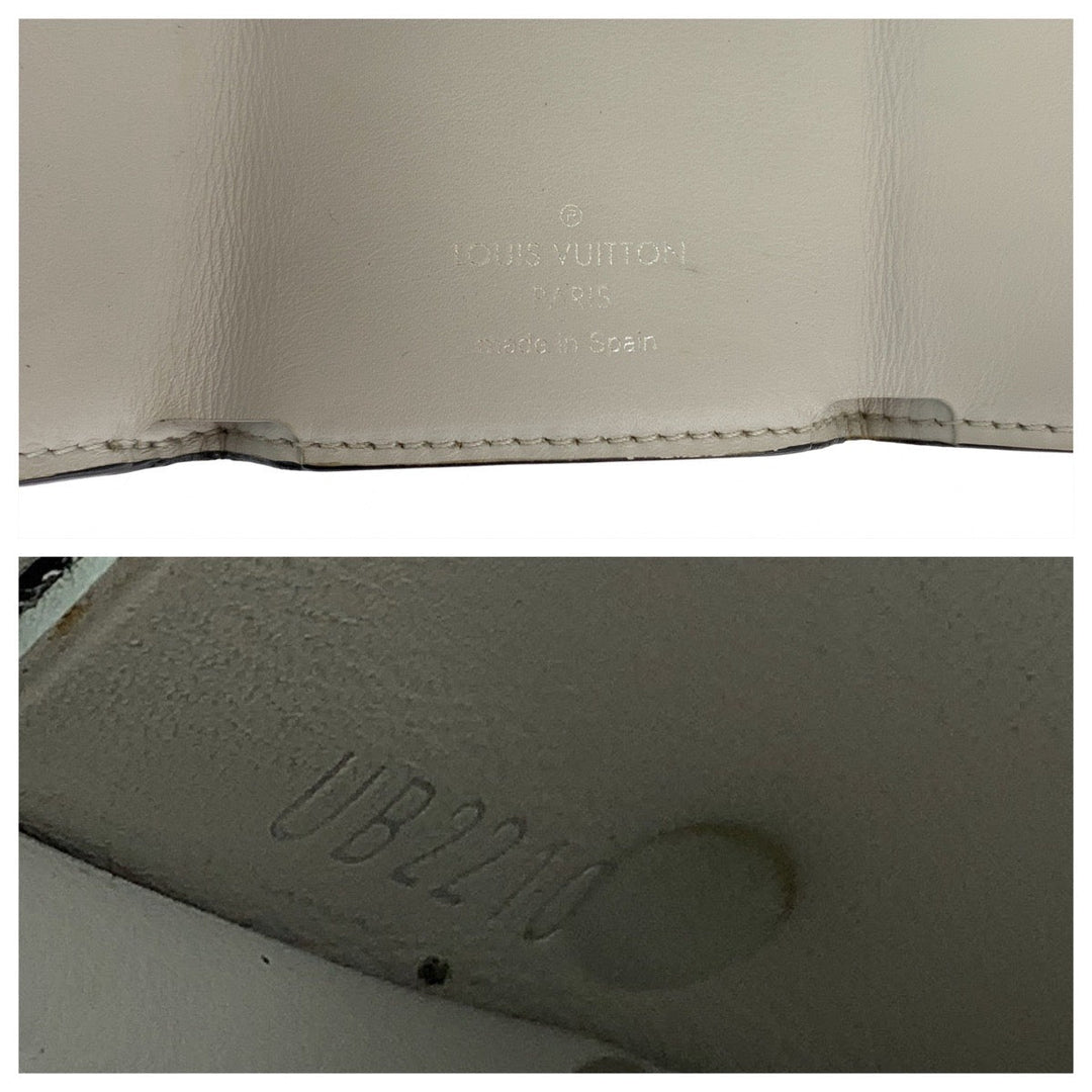 LOUIS VUITTON Tri-fold wallet M30899 PVC, Taiga Bron White SilverMetal Folding wallet Compact wallet Monogram Tiger Llama Discovery mens Used Authentic
