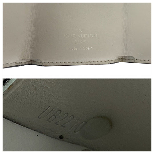 LOUIS VUITTON Tri-fold wallet M30899 PVC, Taiga Bron White SilverMetal Folding wallet Compact wallet Monogram Tiger Llama Discovery mens Used Authentic