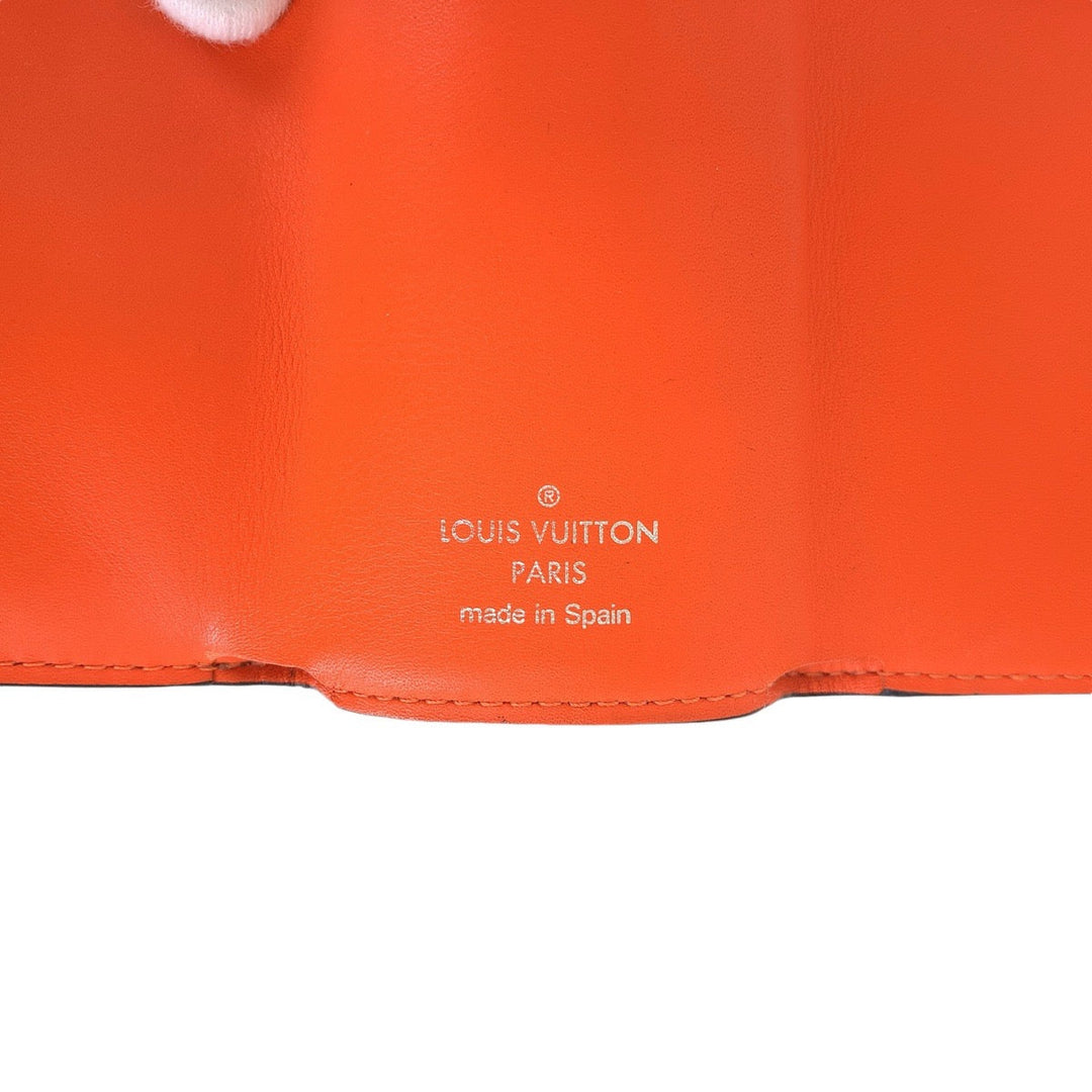 LOUIS VUITTON Tri-fold wallet M69245 leather Volcano orange Folding wallet Compact wallet Taiga Lama Monogram Discovery compact wallet Women Used Authentic
