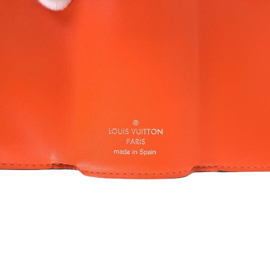 LOUIS VUITTON Tri-fold wallet M69245 leather Volcano orange Folding wallet Compact wallet Taiga Lama Monogram Discovery compact wallet Women Used Authentic