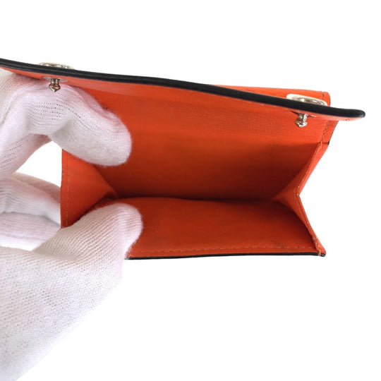 LOUIS VUITTON Tri-fold wallet M69245 leather Volcano orange Folding wallet Compact wallet Taiga Lama Monogram Discovery compact wallet Women Used Authentic