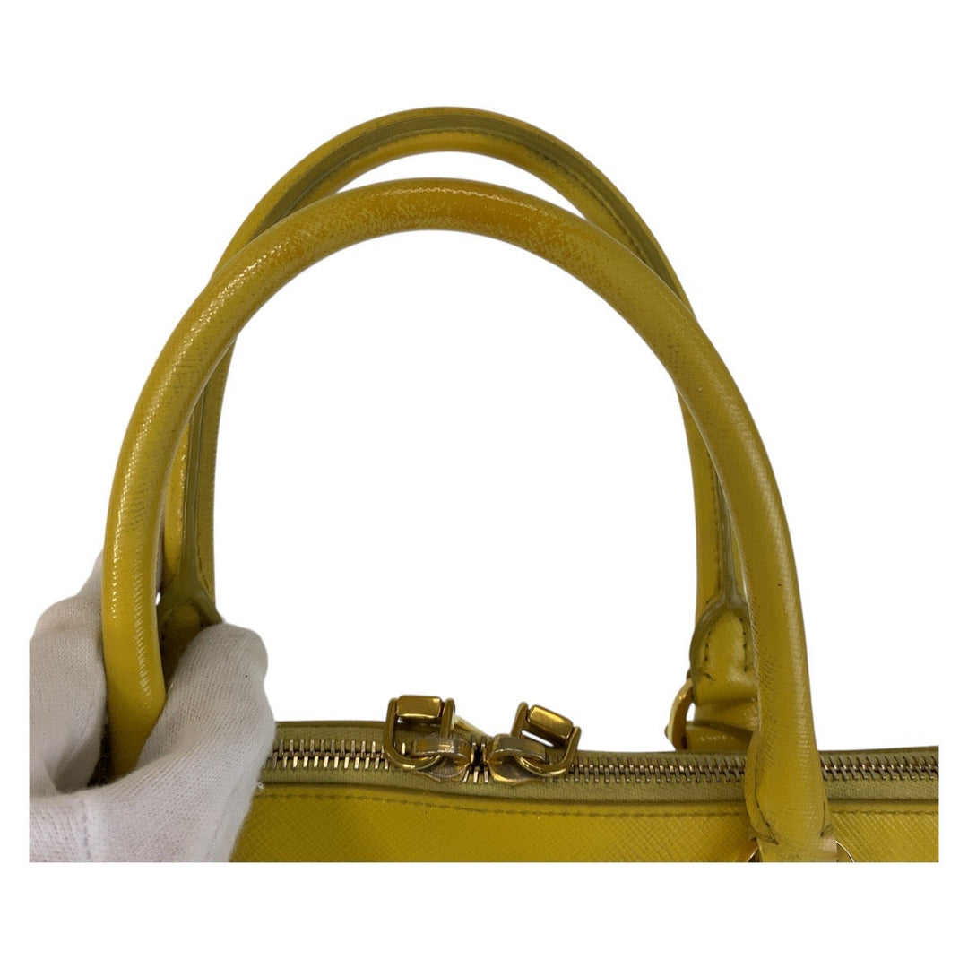 PRADA Handbag leather Yellow Gold Metal Handbag Safiano Promenade triangleWith logo Women Used Authentic