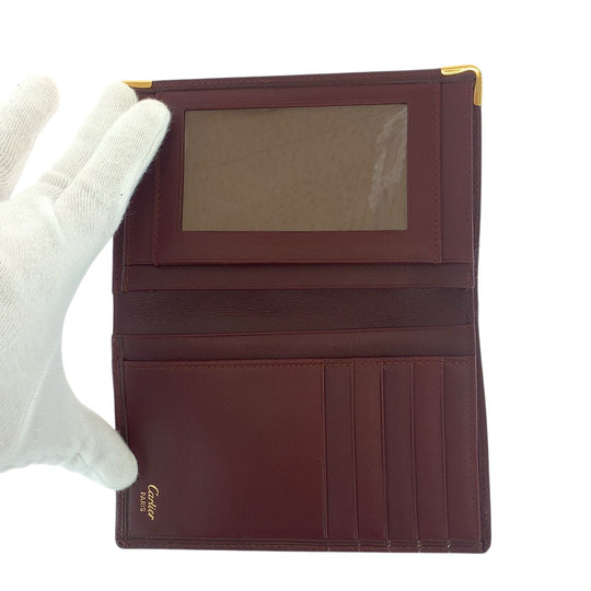 CARTIER Bifold Wallet leather Wine Red Bordeaux Gold Metal Folding wallet Compact wallet Unisex Must Line Women Used Authentic