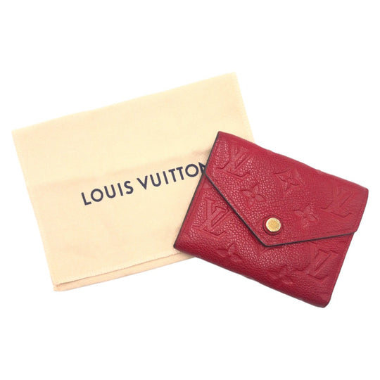 LOUIS VUITTON Tri-fold wallet M63701 PVC Red Scarlet Gold Folding wallet Compact wallet Monogram Unplant Portefeuille Victorine Women Used Authentic