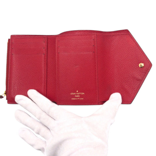 LOUIS VUITTON Tri-fold wallet M63701 PVC Red Scarlet Gold Folding wallet Compact wallet Monogram Unplant Portefeuille Victorine Women Used Authentic