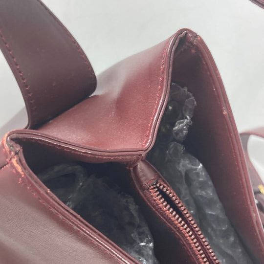 CARTIER Shoulder Bag leather wine-red Must Line Women Used Authentic