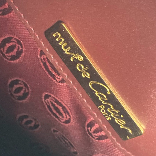 CARTIER Shoulder Bag leather wine-red Must Line Women Used Authentic