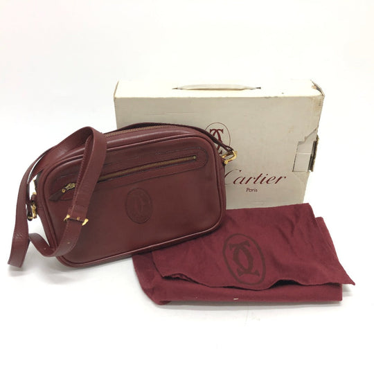 CARTIER Shoulder Bag leather wine-red Must Line Women Used Authentic