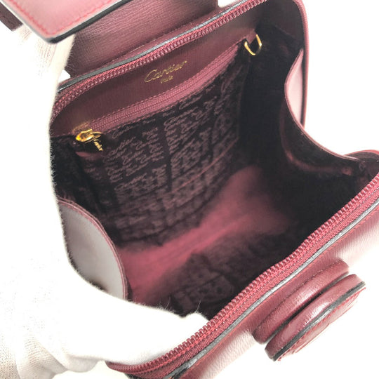 CARTIER Backpack leather wine-red Must Line