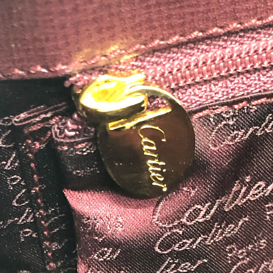 CARTIER Backpack leather wine-red Must Line