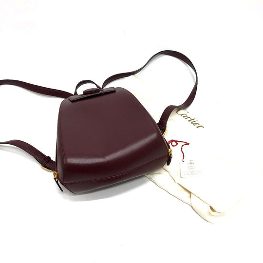 CARTIER Backpack leather wine-red Must Line