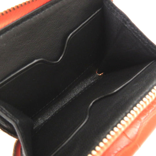 Alexander McQueen Tri-fold wallet 507048 Embossed leather Orange Compact wallet Women Used Authentic
