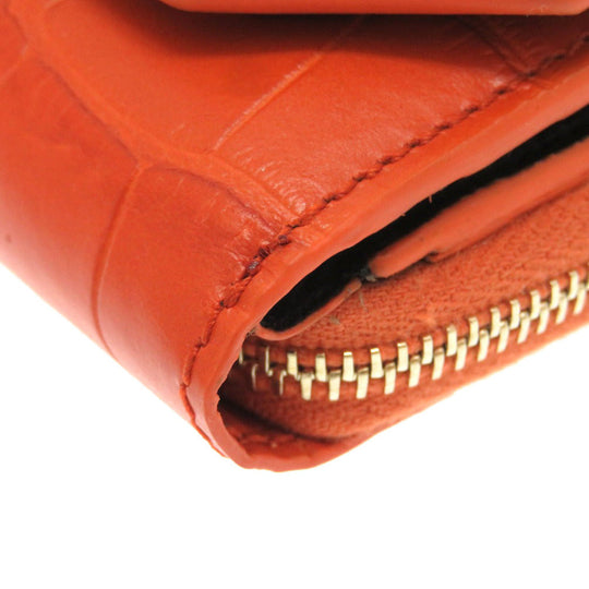 Alexander McQueen Tri-fold wallet 507048 Embossed leather Orange Compact wallet Women Used Authentic