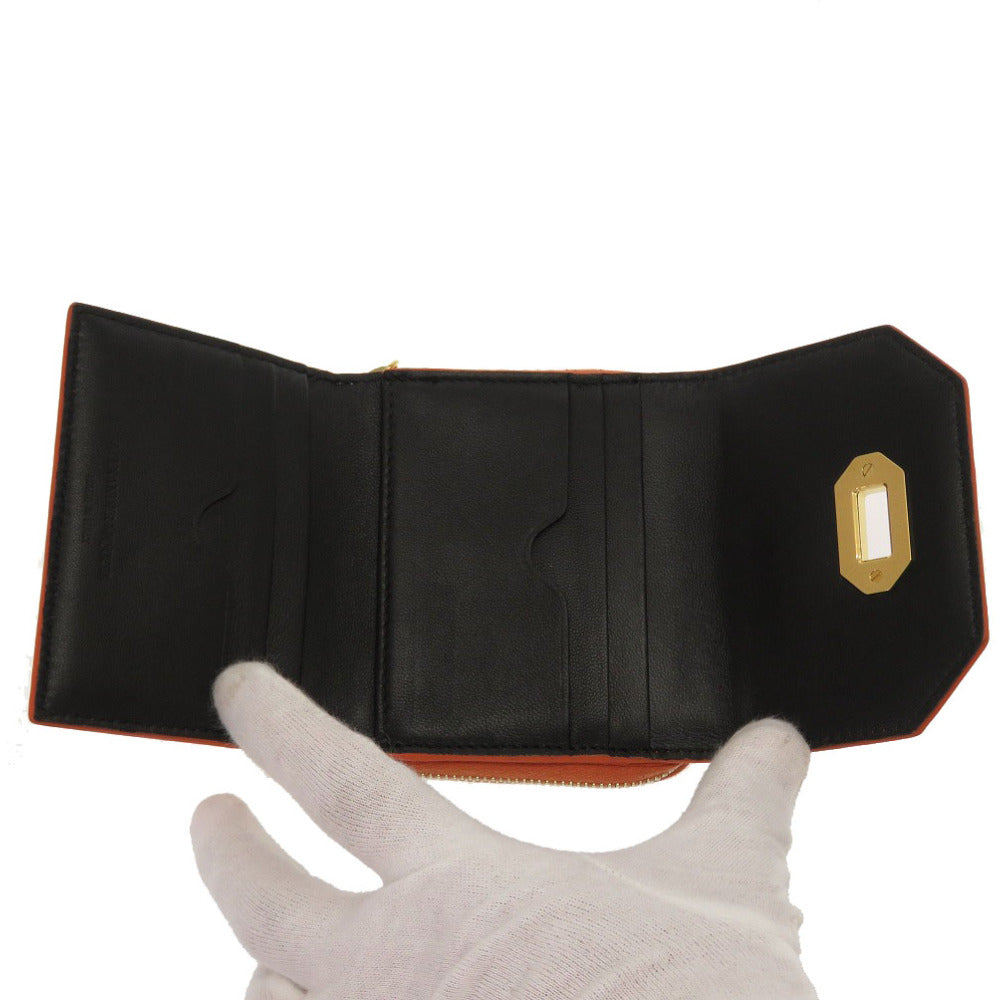 Alexander McQueen Tri-fold wallet 507048 Embossed leather Orange Compact wallet Women Used Authentic