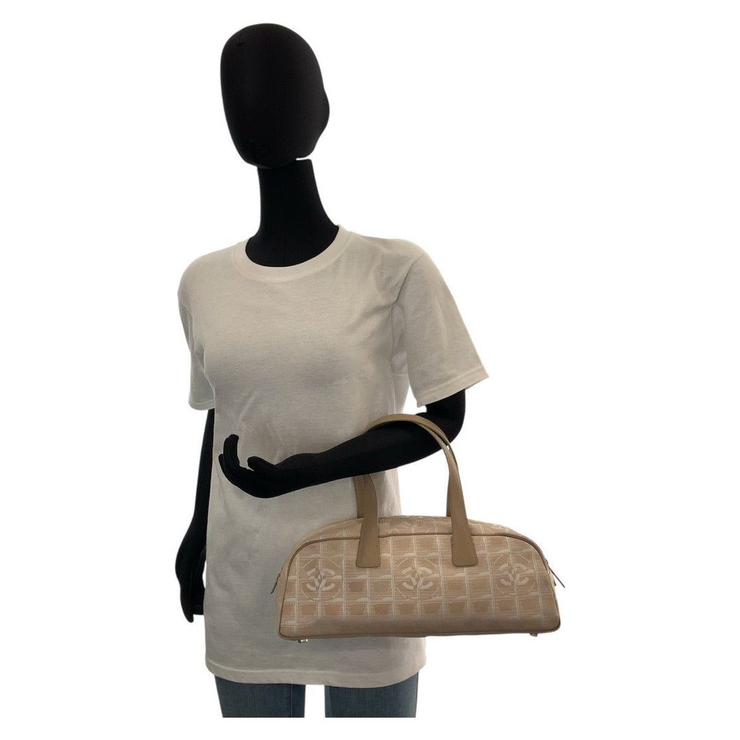 CHANEL Handbag Nylon, Leather Beige Gold Metal Handbags Mini Boston Duffel bag New travel line Women Used Authentic