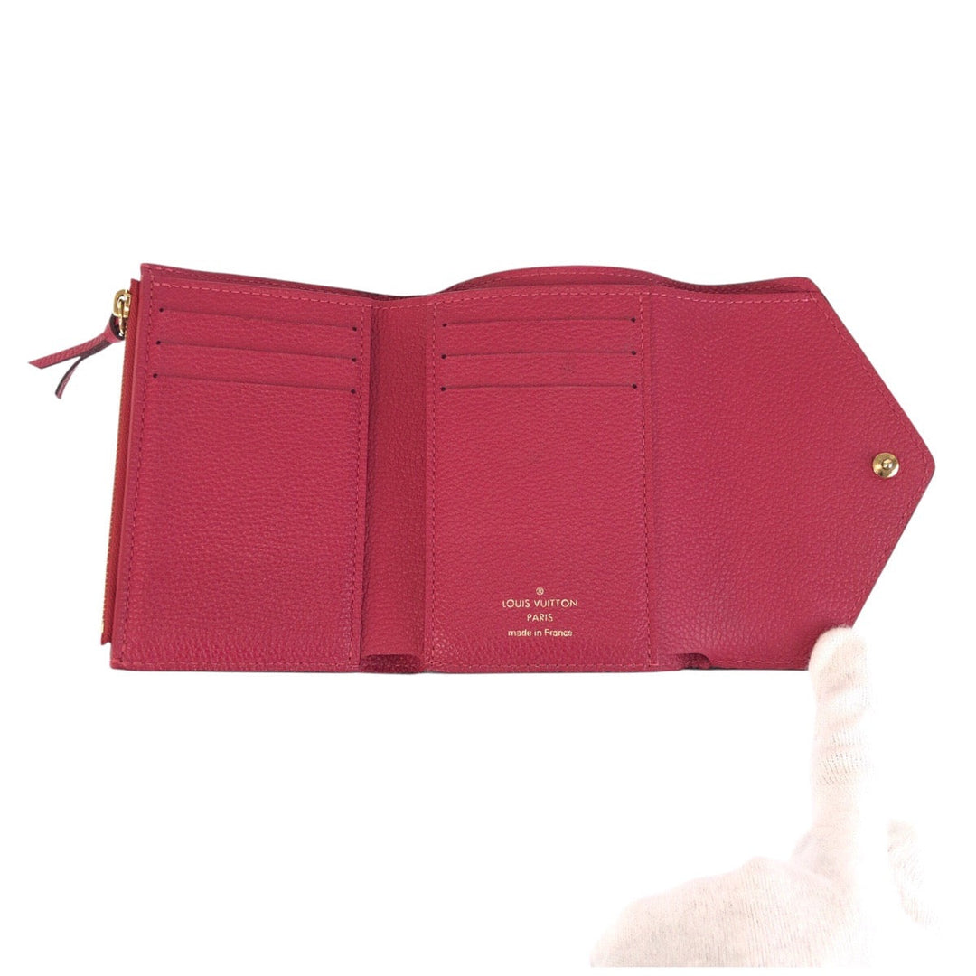 LOUIS VUITTON Tri-fold wallet M64061 leather Pink Gold Metal Folding wallet Compact wallet Empreinte Monogram Portefeuille Victorine Women Used Authentic