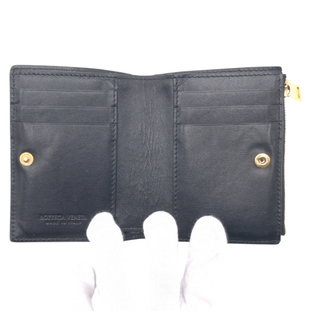 BOTTEGAVENETA Bifold Wallet leather black MAXI INTRECCIATO