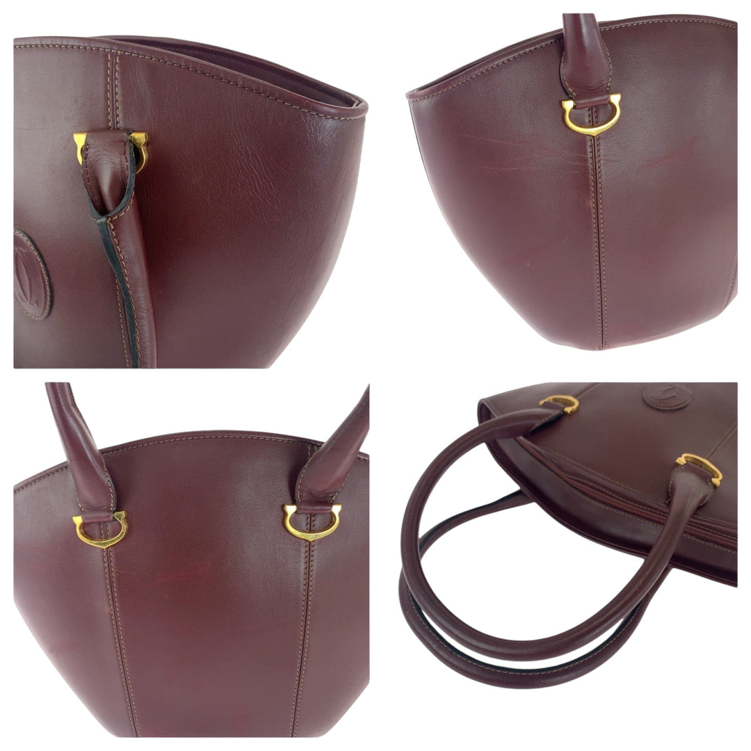 CARTIER Handbag leather wine-red Must Line