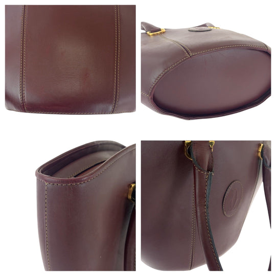 CARTIER Handbag leather wine-red Must Line