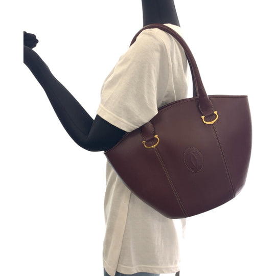 CARTIER Handbag leather wine-red Must Line