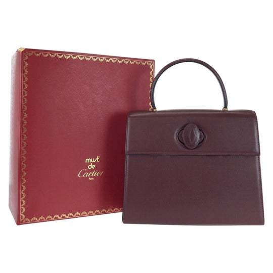 CARTIER Handbag leather wine-red Must Line