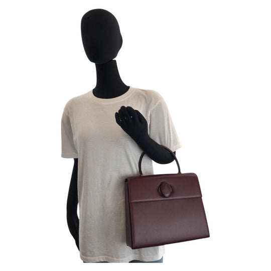 CARTIER Handbag leather wine-red Must Line