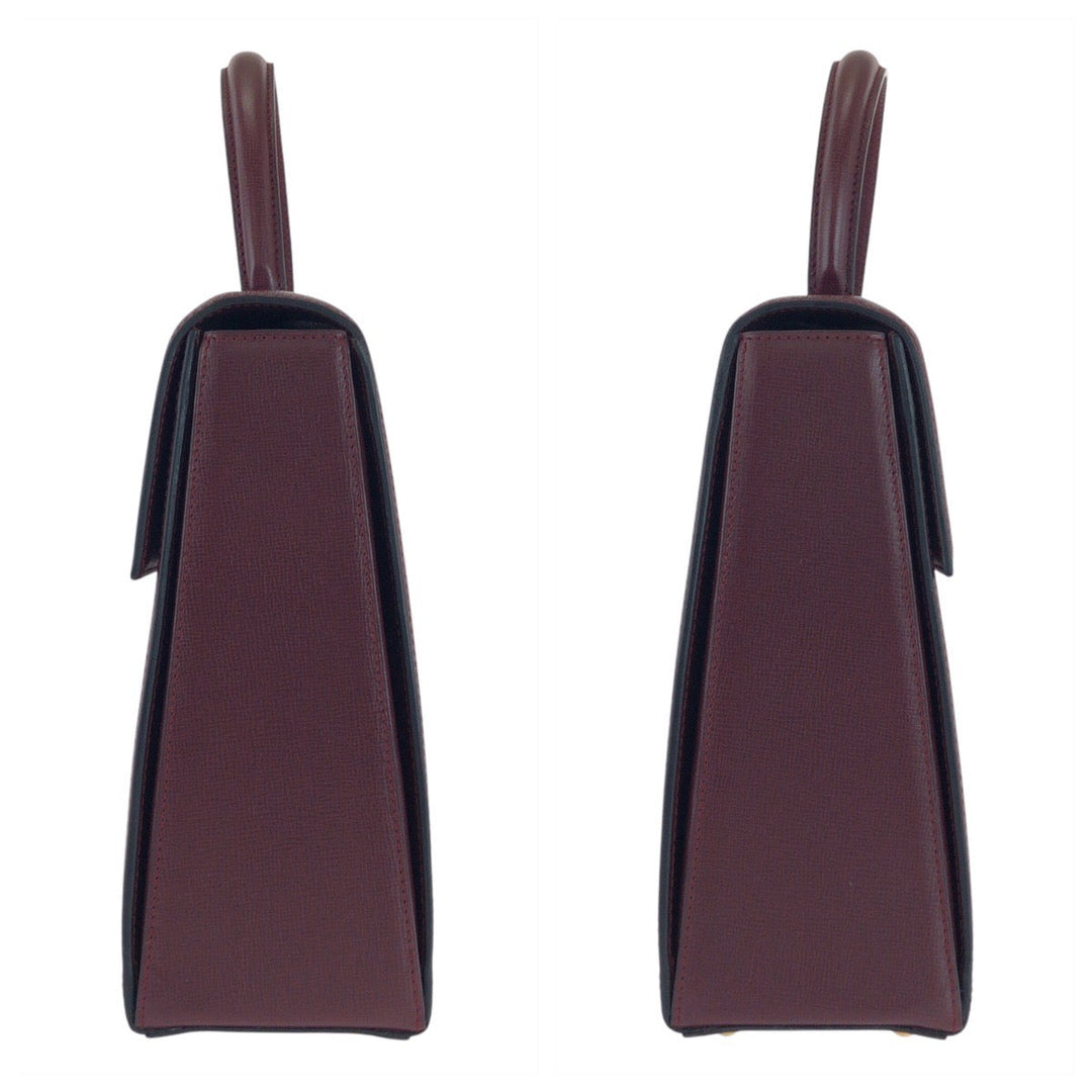 CARTIER Handbag leather wine-red Must Line