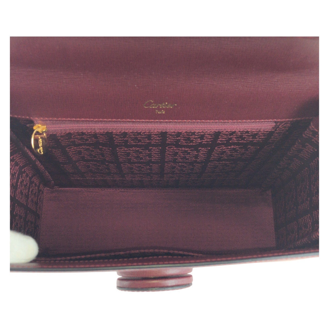 CARTIER Handbag leather wine-red Must Line