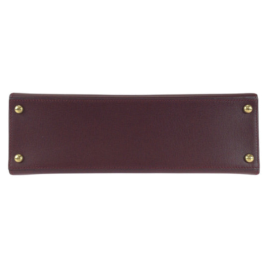 CARTIER Handbag leather wine-red Must Line
