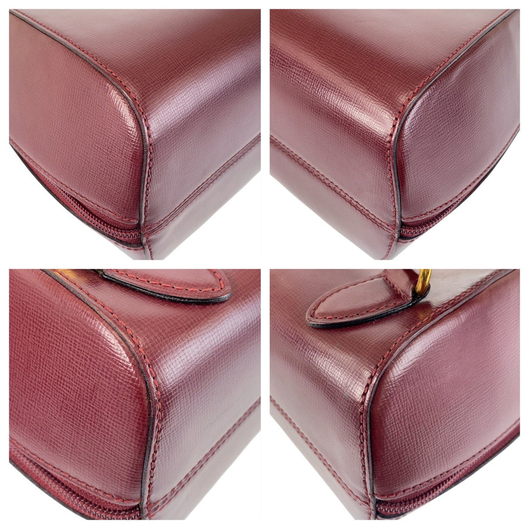 CARTIER Backpack leather wine-red Must Line