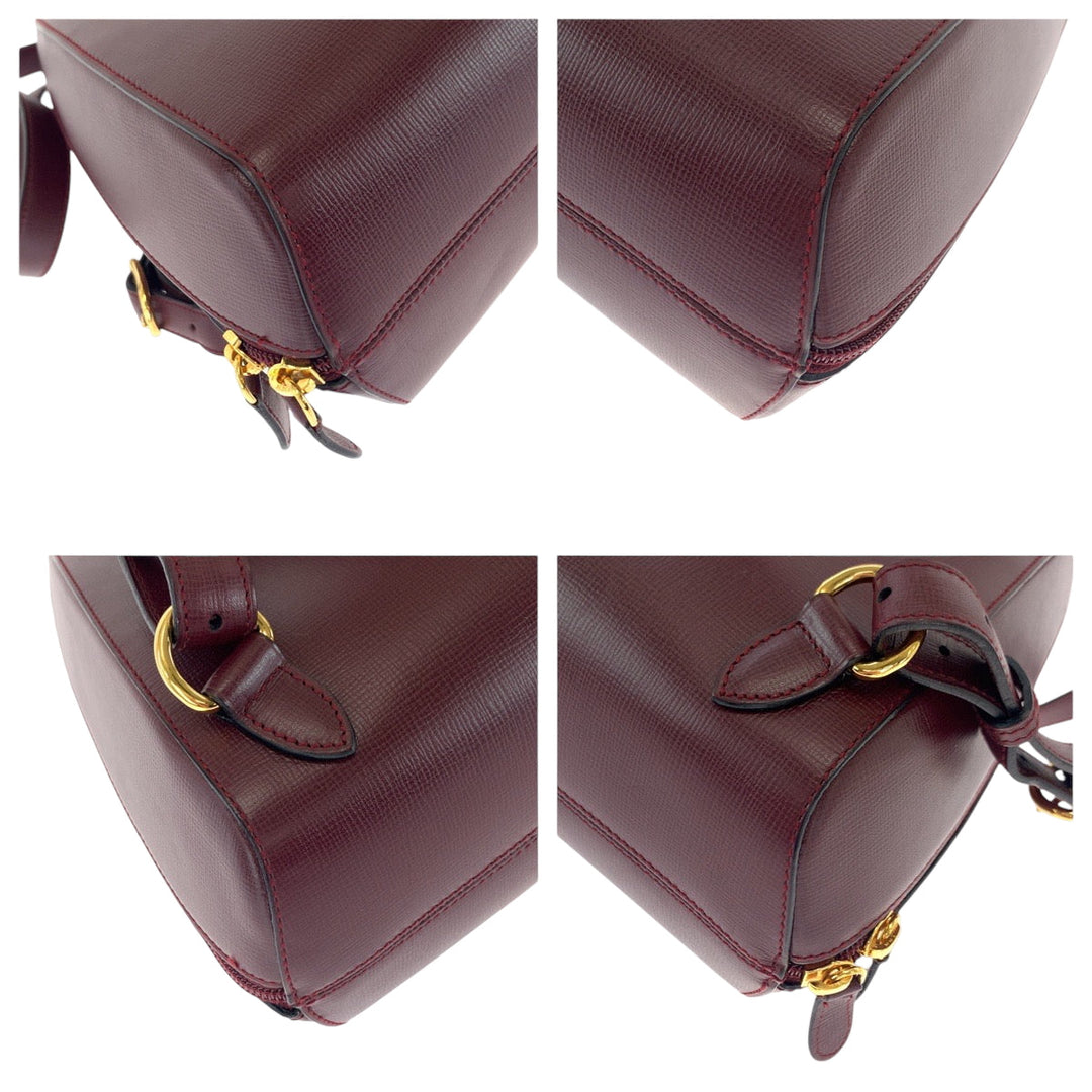 CARTIER Backpack leather wine-red Must Line
