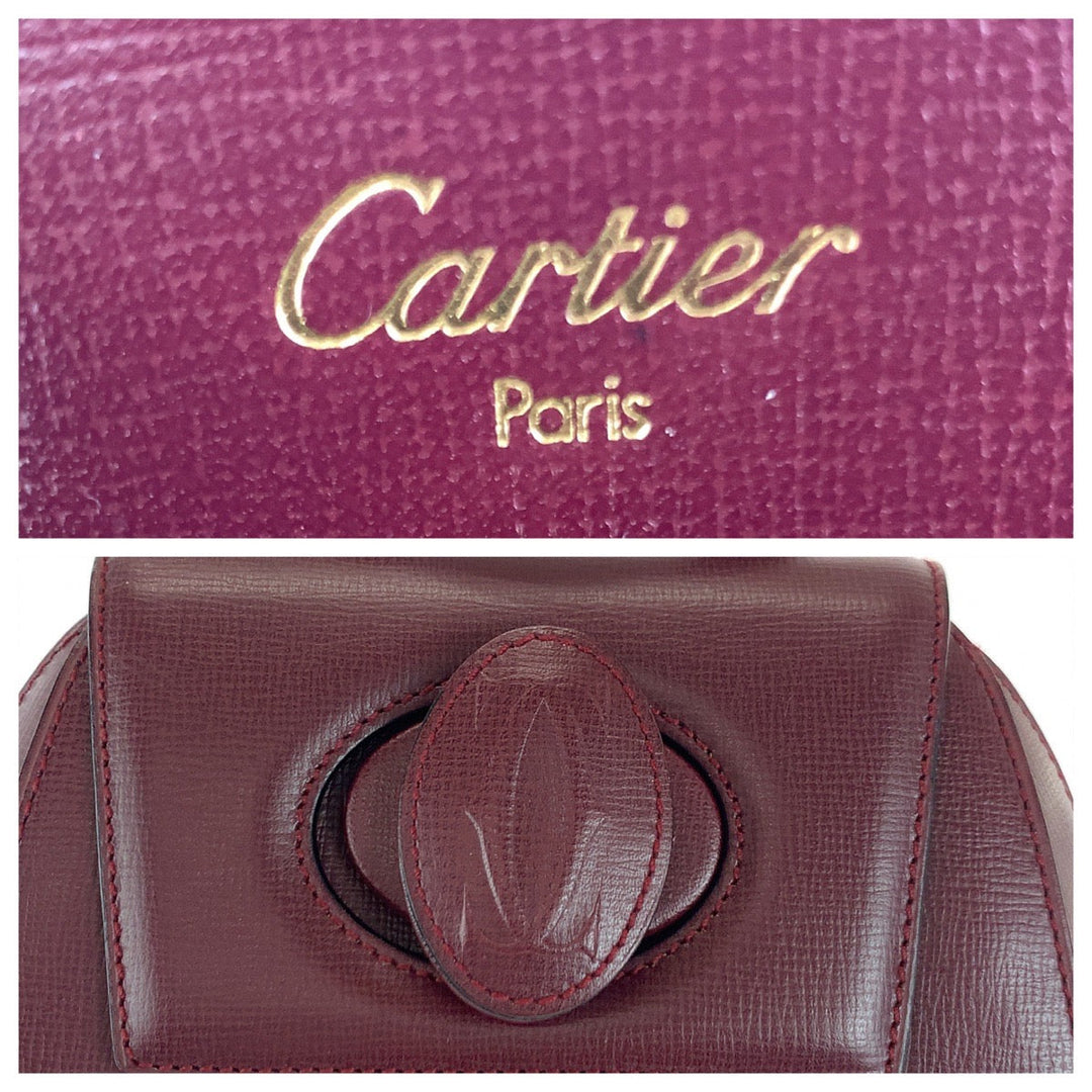 CARTIER Backpack leather wine-red Must Line