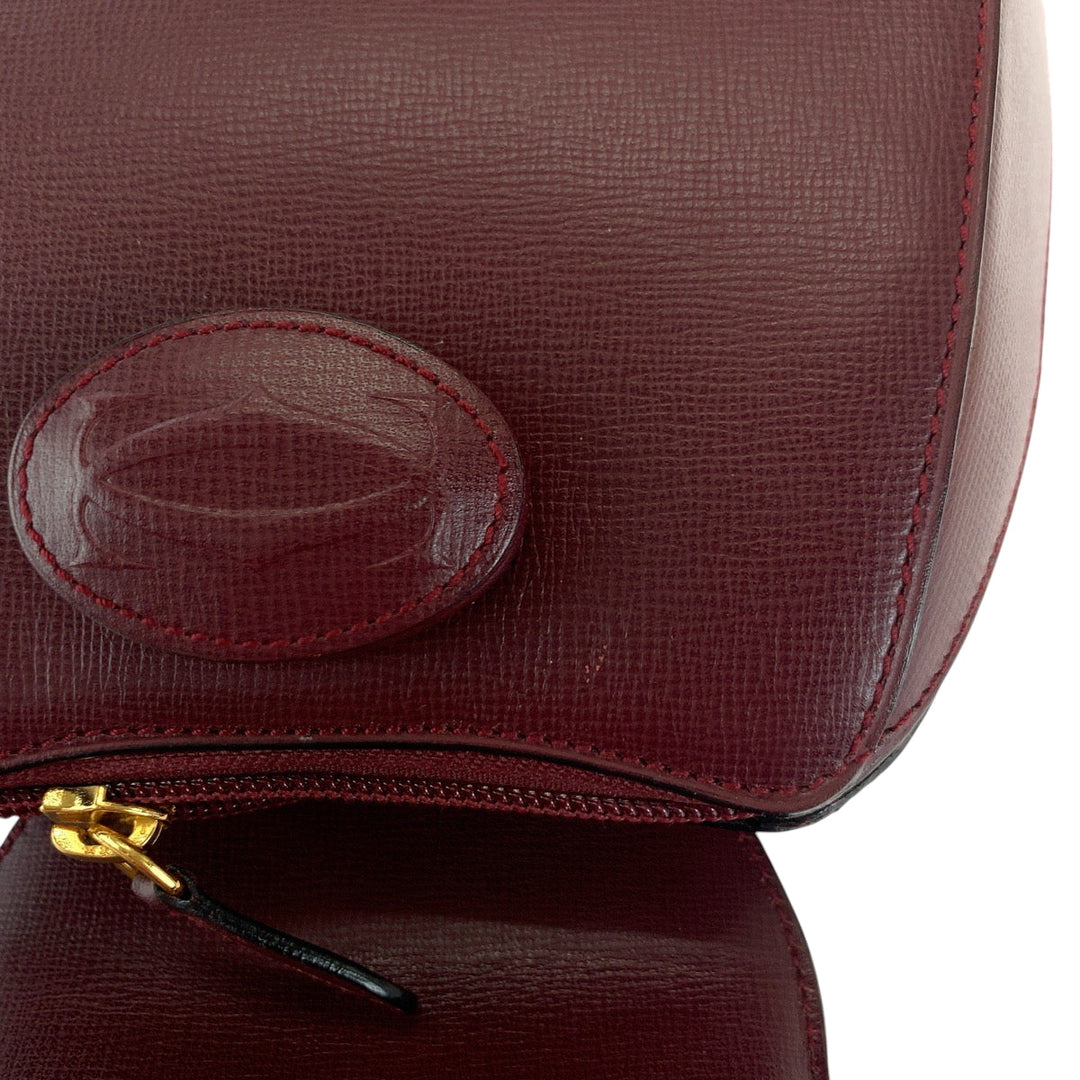 CARTIER Backpack leather wine-red Must Line