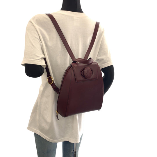 CARTIER Backpack leather wine-red Must Line