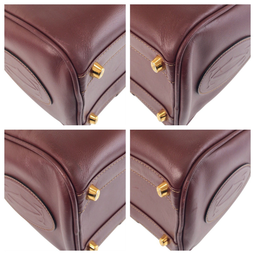 CARTIER Handbag leather Bordeaux Gold Metal Must Line