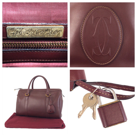 CARTIER Handbag leather Bordeaux Gold Metal Must Line