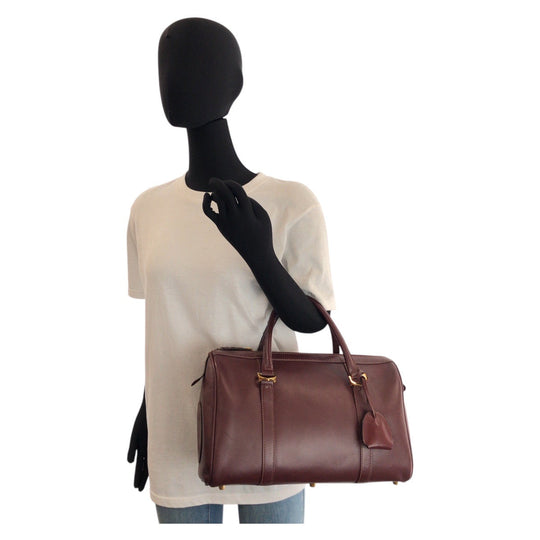 CARTIER Handbag leather Bordeaux Gold Metal Must Line