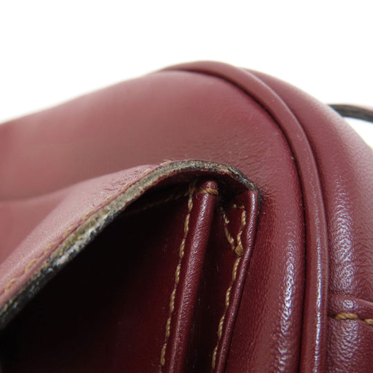CARTIER Shoulder Bag leather wine-red Must Line Women Used Authentic