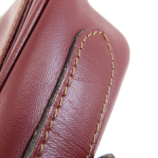 CARTIER Shoulder Bag leather wine-red Must Line Women Used Authentic