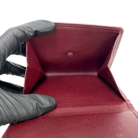 CARTIER Tri-fold wallet leather wine-red Must Line